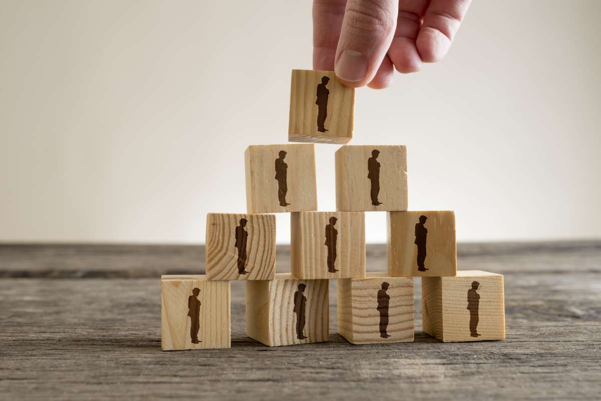 Brick stack representing pyramid scheme